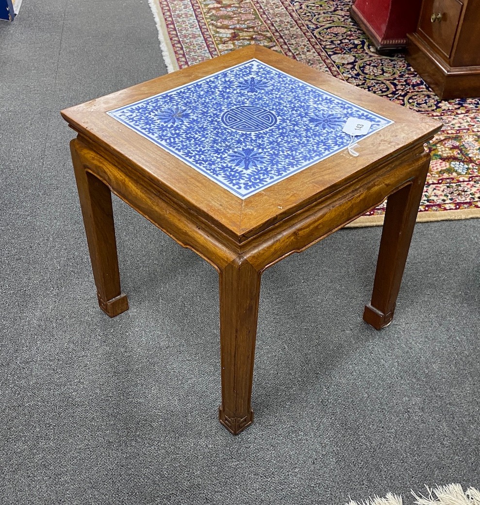 A Chinese hardwood and underglaze blue porcelain tile inset table, width 42cm, depth 42cm, height 43cm